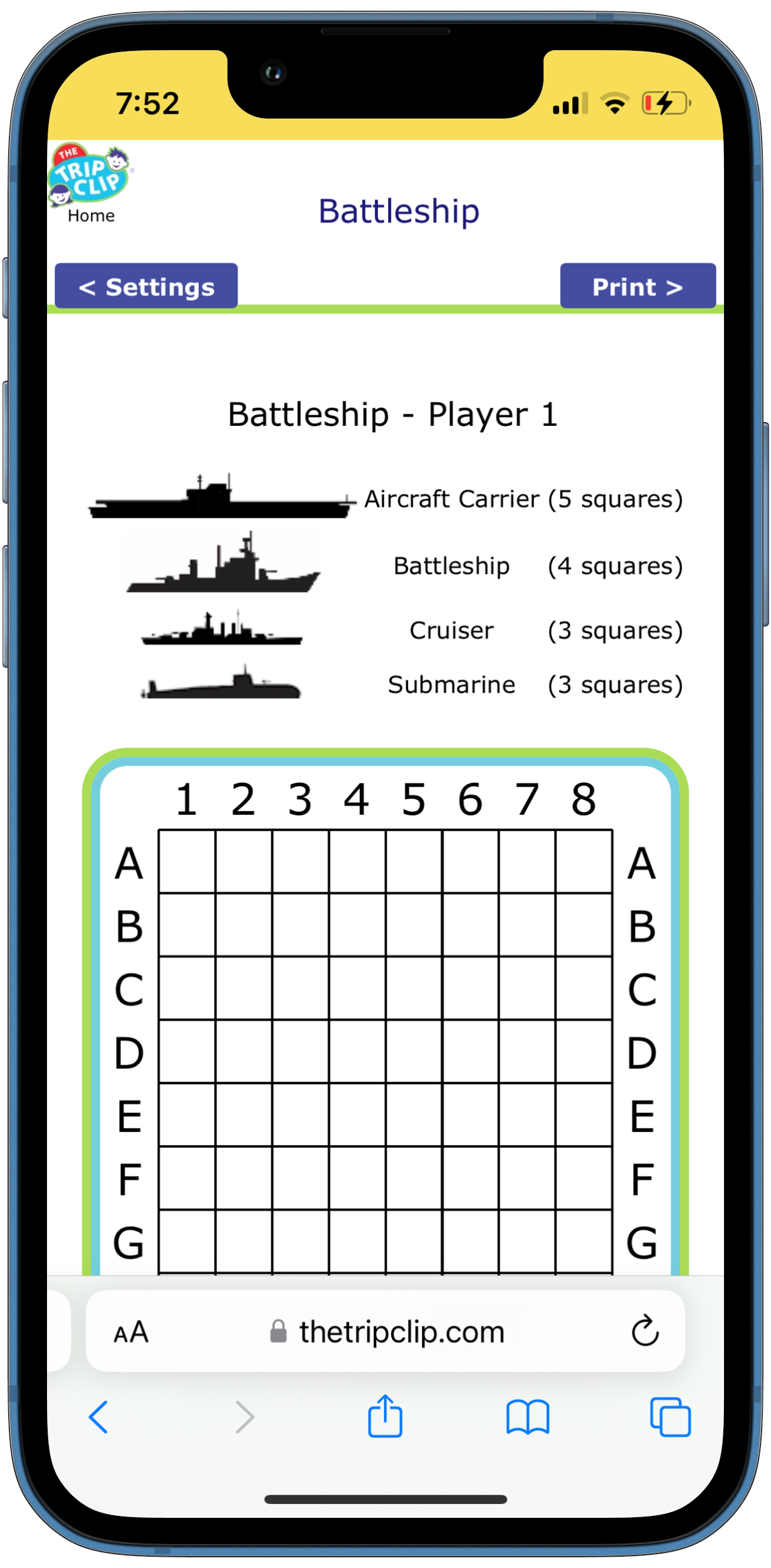 Child using paper battleship game with clipboard and attached pen while camping.