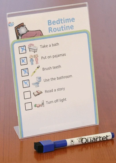 5x7 plastic frame showing picture bedtime routine and dry erase marker